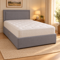 Divan Base in grey fabric with headboard and mattress, in a cosy bedroom